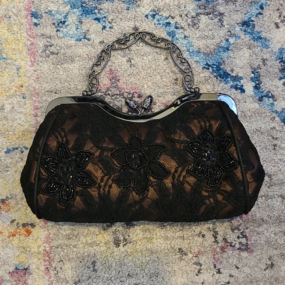 Black and nude lace clutch